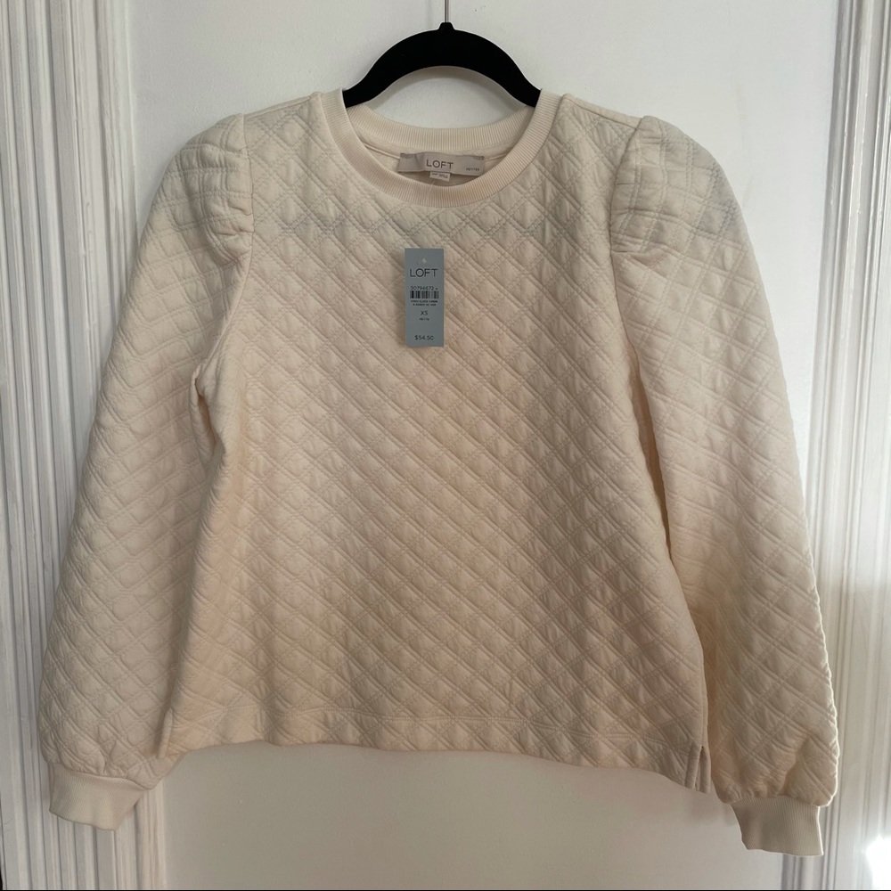 Loft quilted top